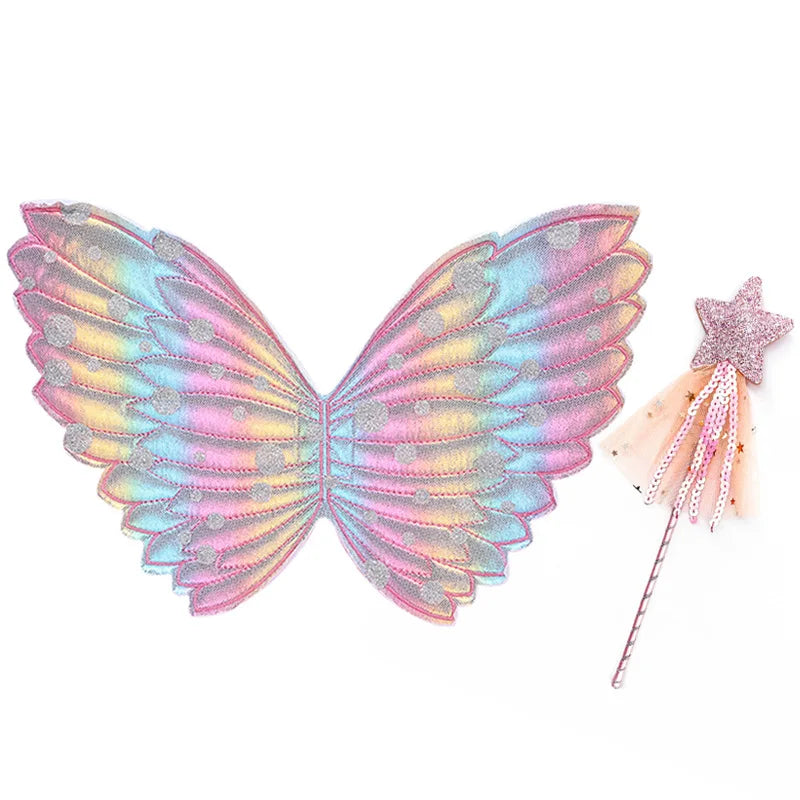 Colorful butterfly wings with a pastel rainbow gradient are paired with a glittery pink star wand. The wings have silver dots, and the wand has streaming ribbons.