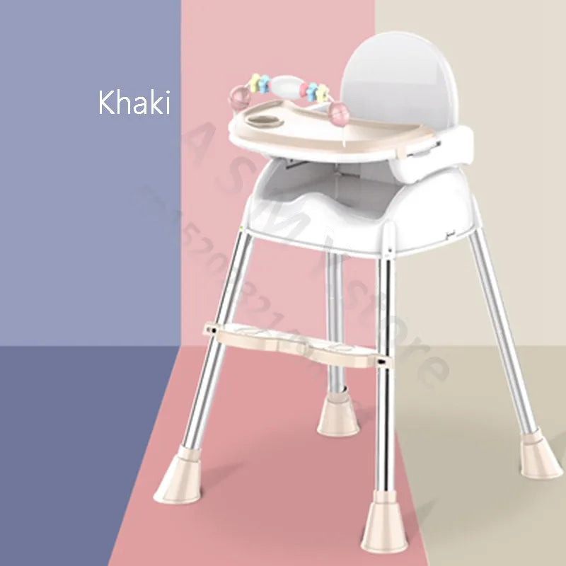 Khaki-colored baby high chair with a beige tray and colorful toy bar, featuring a four-legged metal base on a split-color background of blue, pink, and beige.
