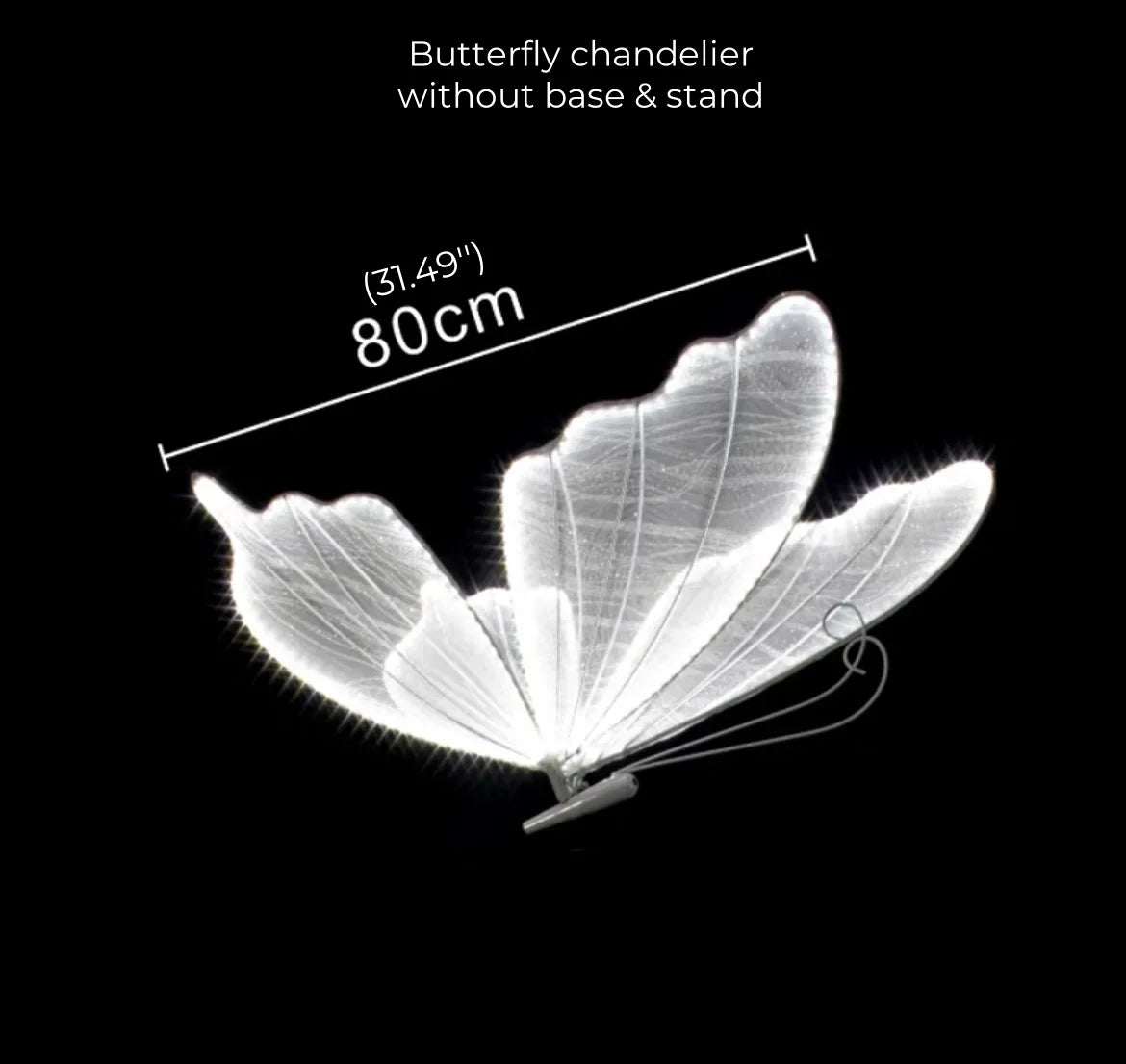 Luminous butterfly-shaped chandelier measuring 80 cm (31.49 inches) in wingspan, shown against a dark background. Text indicates it is without base and stand.