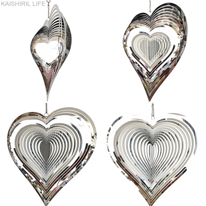 Four metallic heart-shaped wind spinners with layered, reflective designs are displayed against a white background. Each spinner features concentric heart patterns.