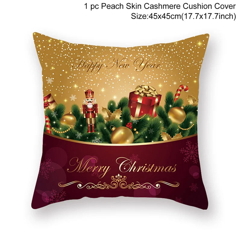 Festive cushion cover with gold and maroon design. Features "Happy New Year" and "Merry Christmas" text, gold baubles, a nutcracker, candy cane, and gift box on a pine garland.