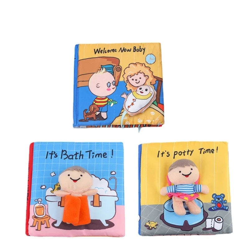 Three colorful cloth books for babies, featuring themes "Welcome New Baby," "It's Bath Time," and "It's Potty Time," each with playful illustrations and plush attachments.