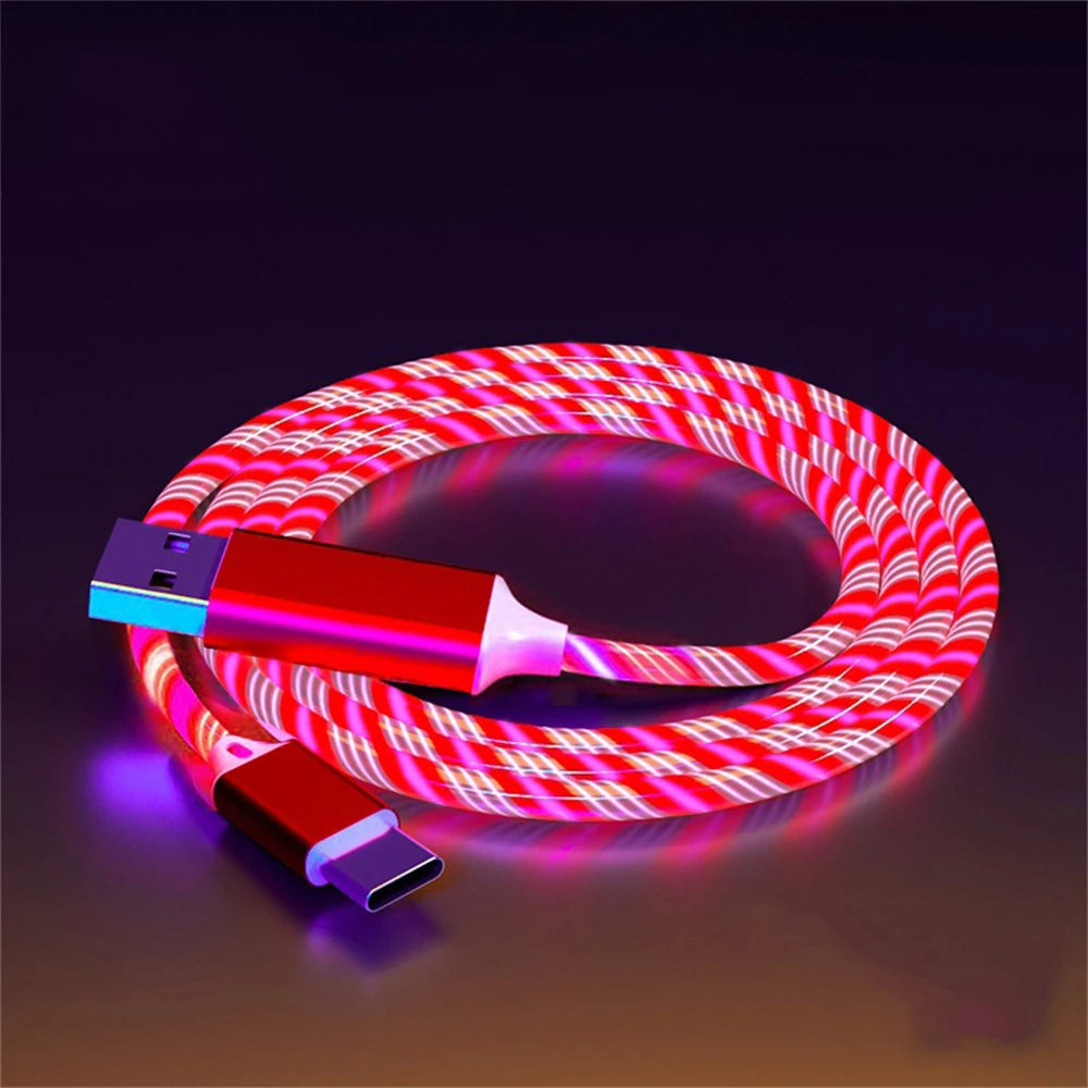 A glowing red and pink USB-C charging cable with illuminated spiral pattern on a dark background. The connectors are metallic red and purple, creating a vibrant, futuristic look.