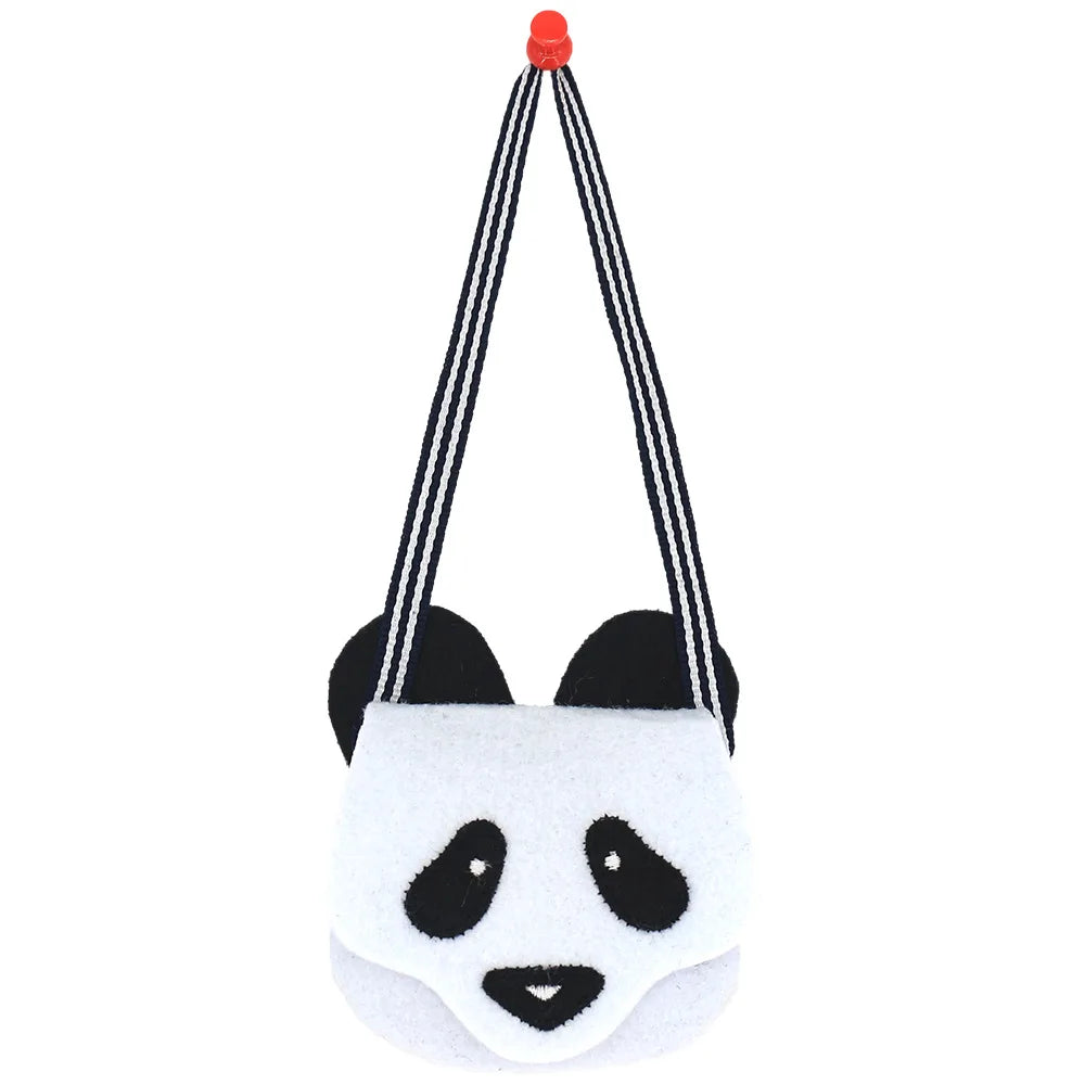 Cute panda-themed shoulder bag with black and white striped strap, featuring a smiling face with big eyes and ears, hung by a red hook.