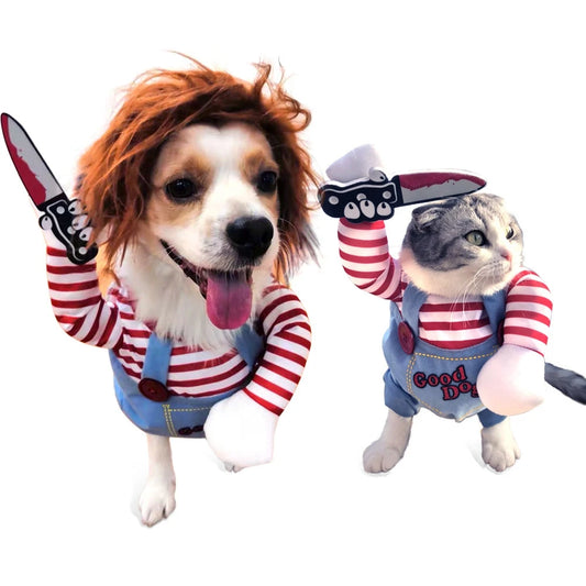 Dog and cat in red striped shirts and blue overalls, each holding toy knives. The dog has a wig and its tongue out. The cat looks to the side. Both outfits say "Good Dog."