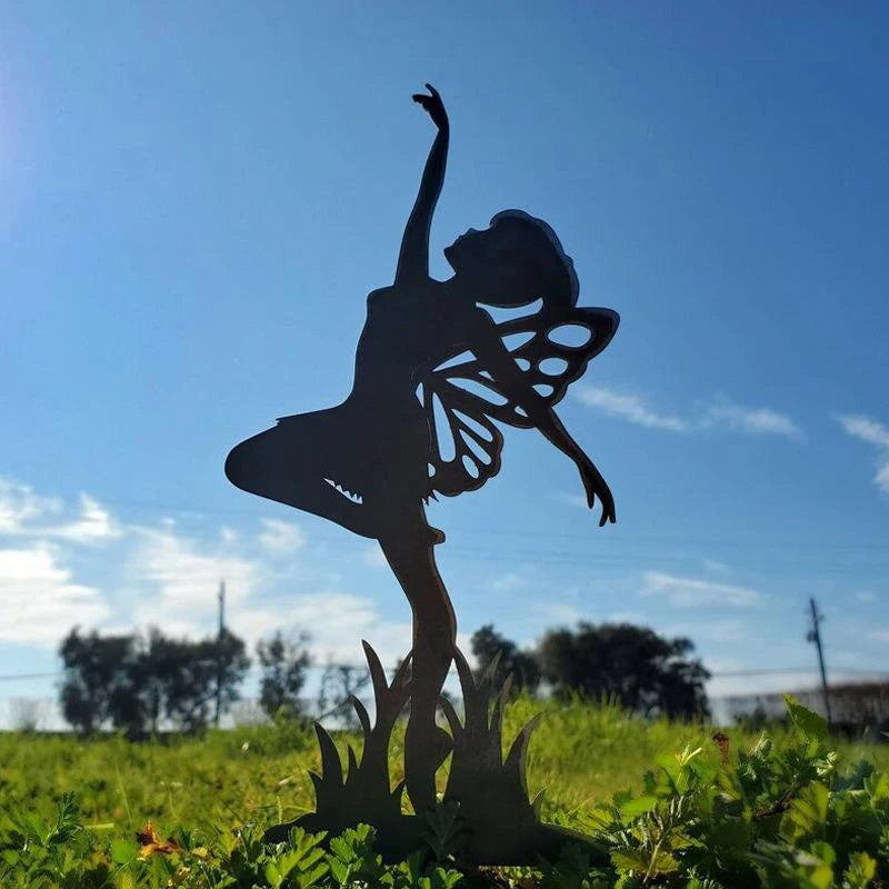 Silhouette of a fairy with butterfly wings gracefully dancing in a grassy field under a clear blue sky, surrounded by distant trees and tall grass.