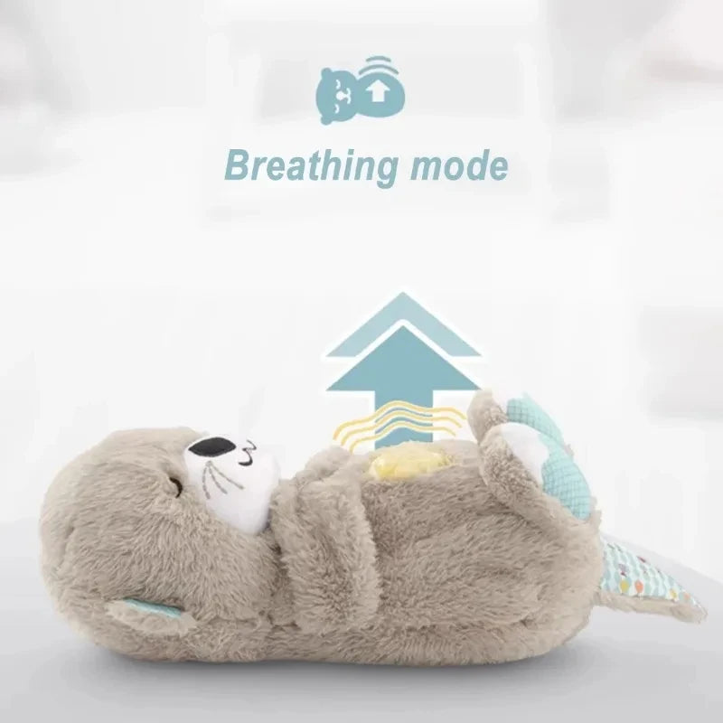 A plush toy otter in "breathing mode," lying on its back. An arrow with wavy lines shows the breathing effect. The text "Breathing mode" is displayed above.