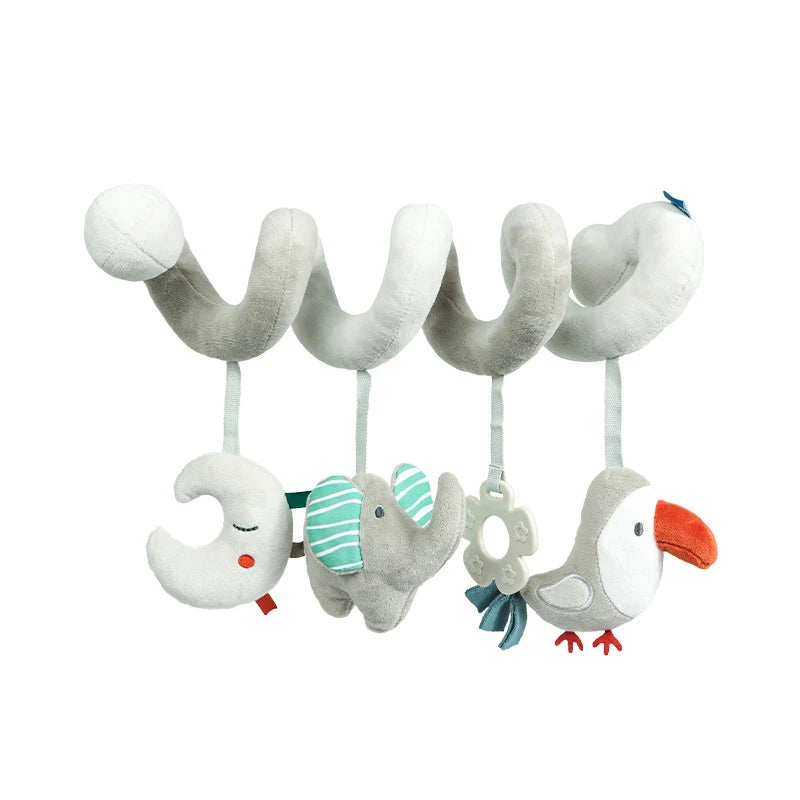 A plush spiral crib toy features a moon, elephant, ring, and bird in soft gray tones with teal and orange accents, designed for infants to engage and explore.
