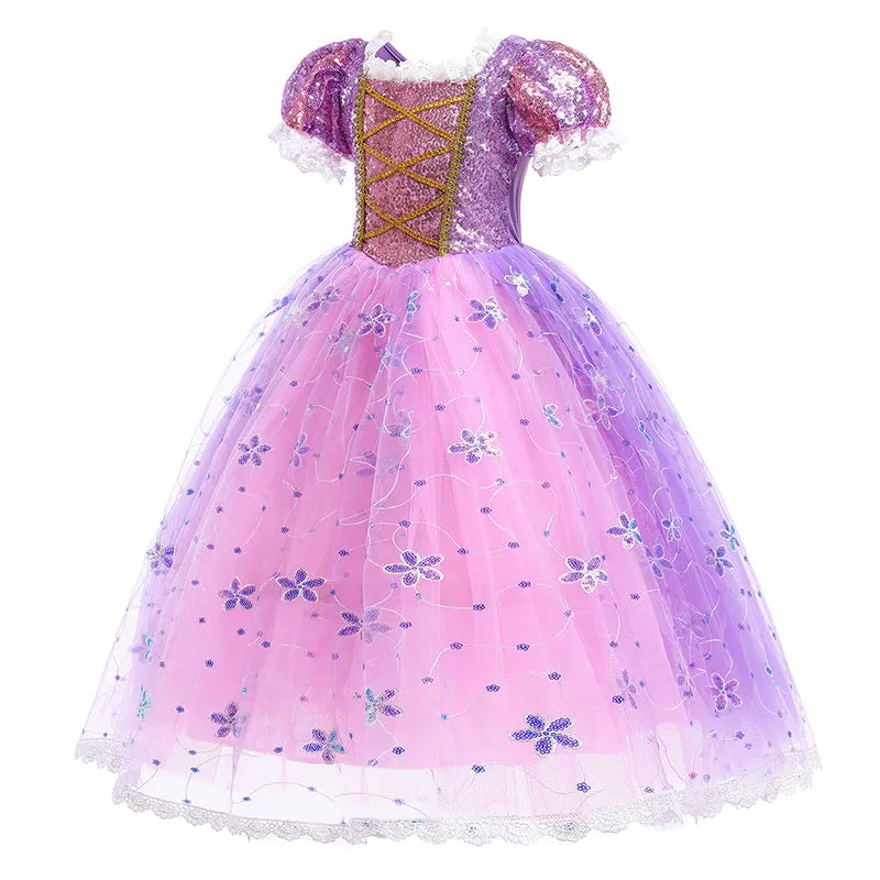 Purple and pink princess dress with a sequined bodice, puffy sleeves, and a flower-patterned tulle skirt. Adorned with lace trim and golden crisscross accents.