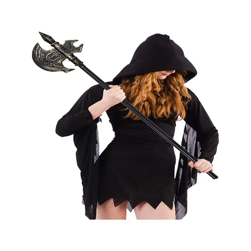 Woman in a black hooded costume with flowing sleeves holds a decorative double-edged axe, looking down. Her long hair is visible beneath the hood.