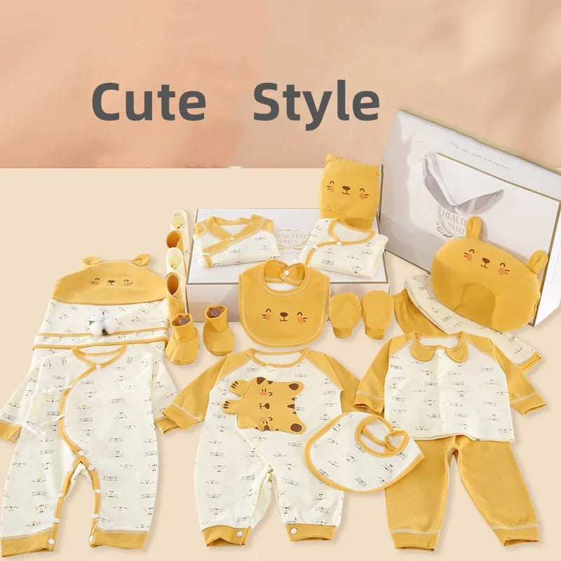 Yellow and white baby clothing set with animal designs, including onesies, bibs, socks, and a head pillow. The words "Cute Style" are above the neatly arranged items.