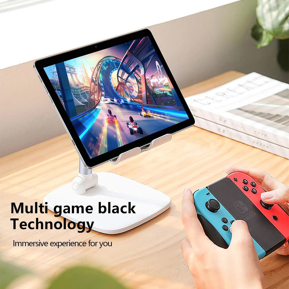 Tablet on stand displaying a vibrant racing game. A person's hands are holding a gaming controller. Text reads, "Multi game black Technology. Immersive experience for you."