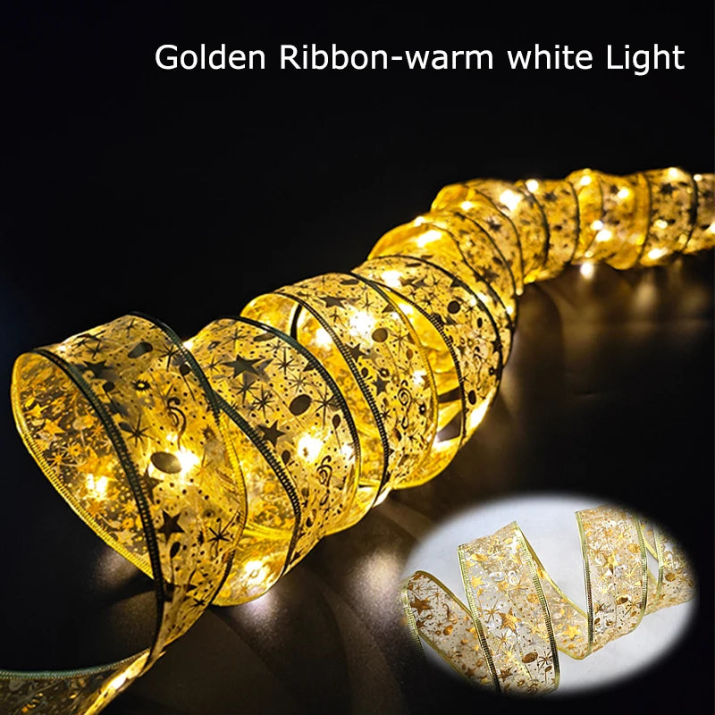 Golden ribbon with warm white lights, featuring star and music note patterns. The illuminated ribbon creates a glowing effect suitable for festive decoration.