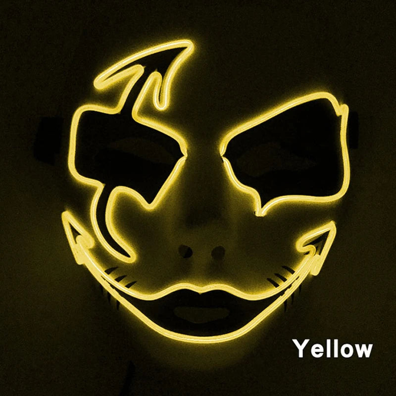 Glowing yellow LED mask with stylized, jagged eyes and mouth lines, creating a sinister expression. The word "Yellow" is written in the bottom right corner.