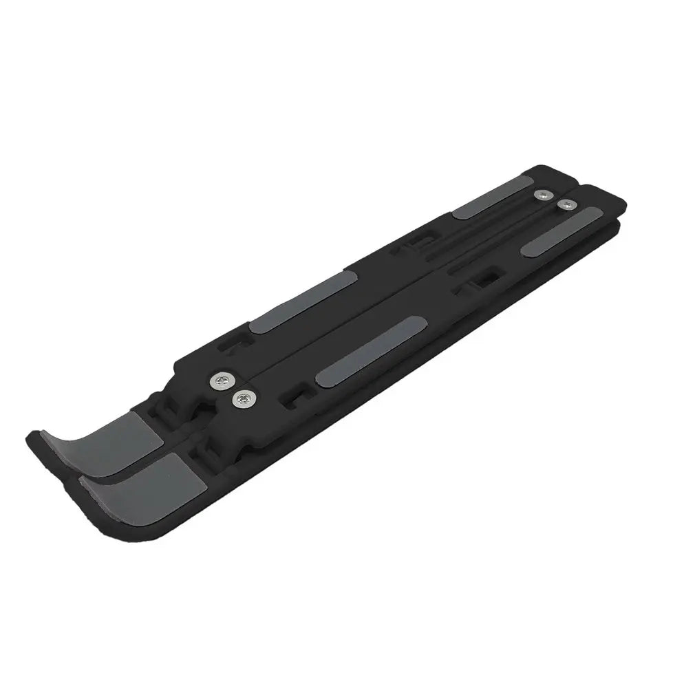 Black metal tool with a flat, elongated body, featuring dual sleek grooves and two screws near one end. The opposite end has a wider, curved edge.