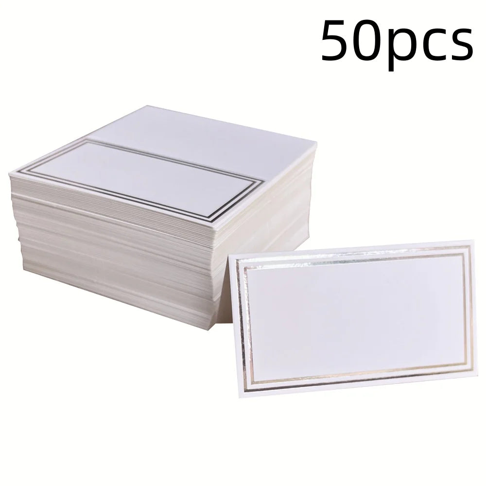 Stack of 50 white cards with metallic borders, featuring a blank center for writing. One card is displayed in front, emphasizing the border detail.