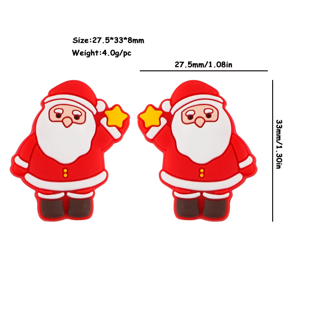 Two cartoon Santa figurines in red suits, holding yellow stars. Dimensions shown: 27.5x33x8mm, weight 4.0g each. Measurement lines indicate 27.5mm width, 33mm height.