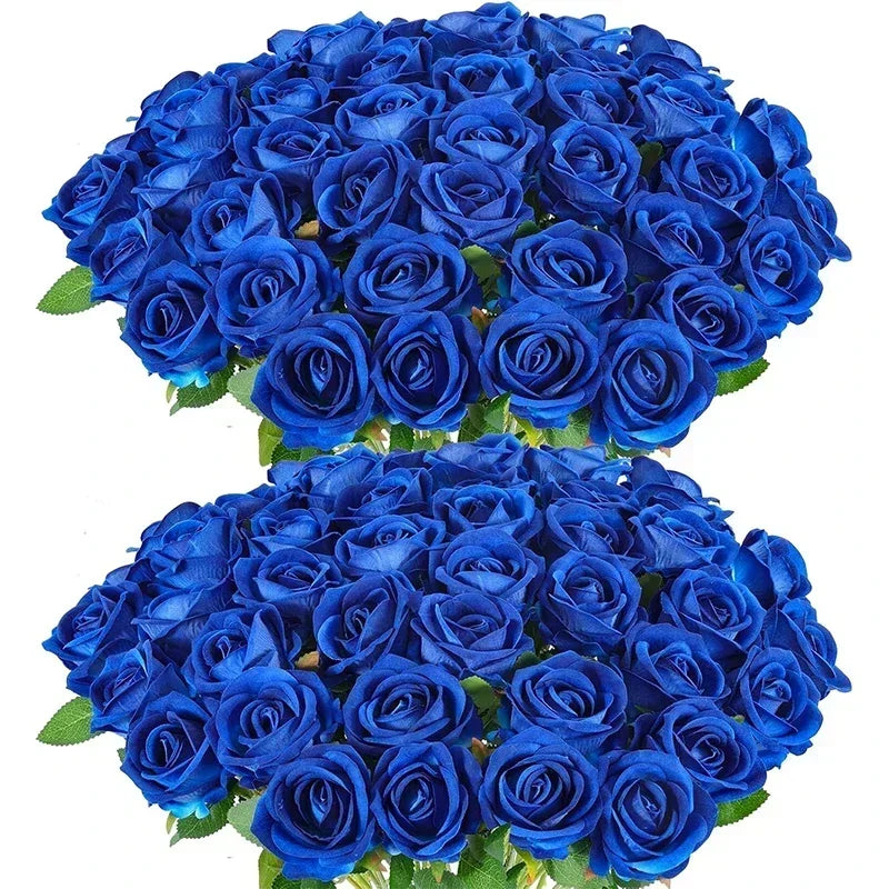 A large, dense bouquet of vibrant blue roses with green leaves, perfectly arranged. The petals have a rich, deep blue hue, creating a striking and elegant display.
