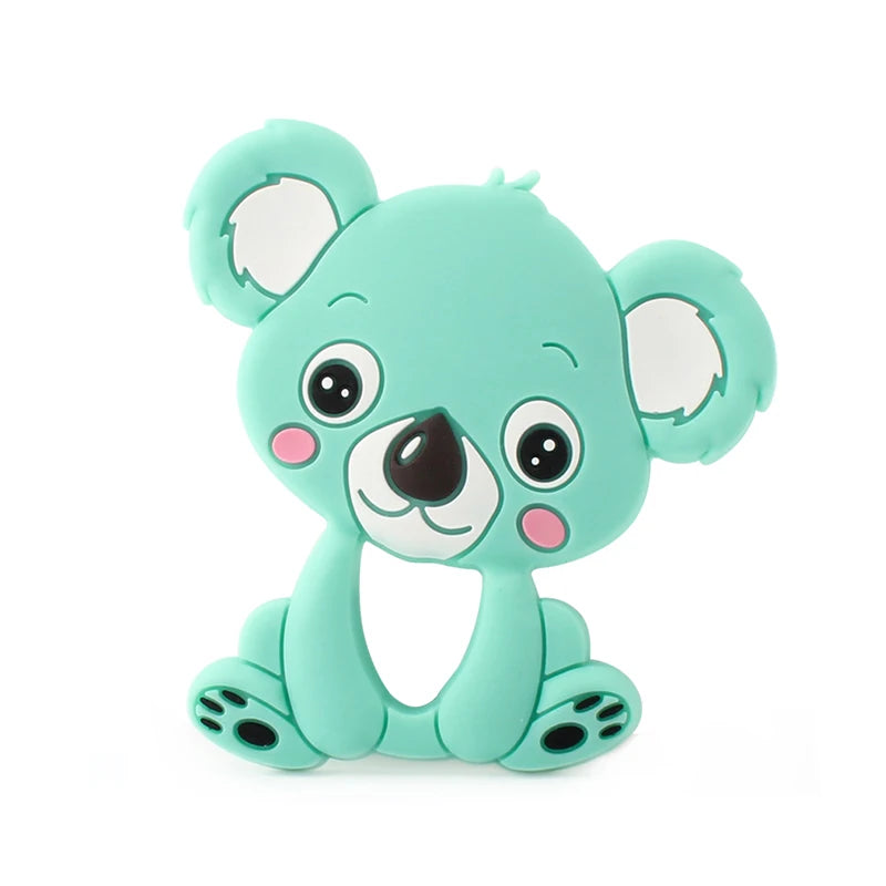 Cute teal koala-shaped silicone teether with big eyes, rosy cheeks, and a small smile. The teether is in a sitting position, designed for babies.