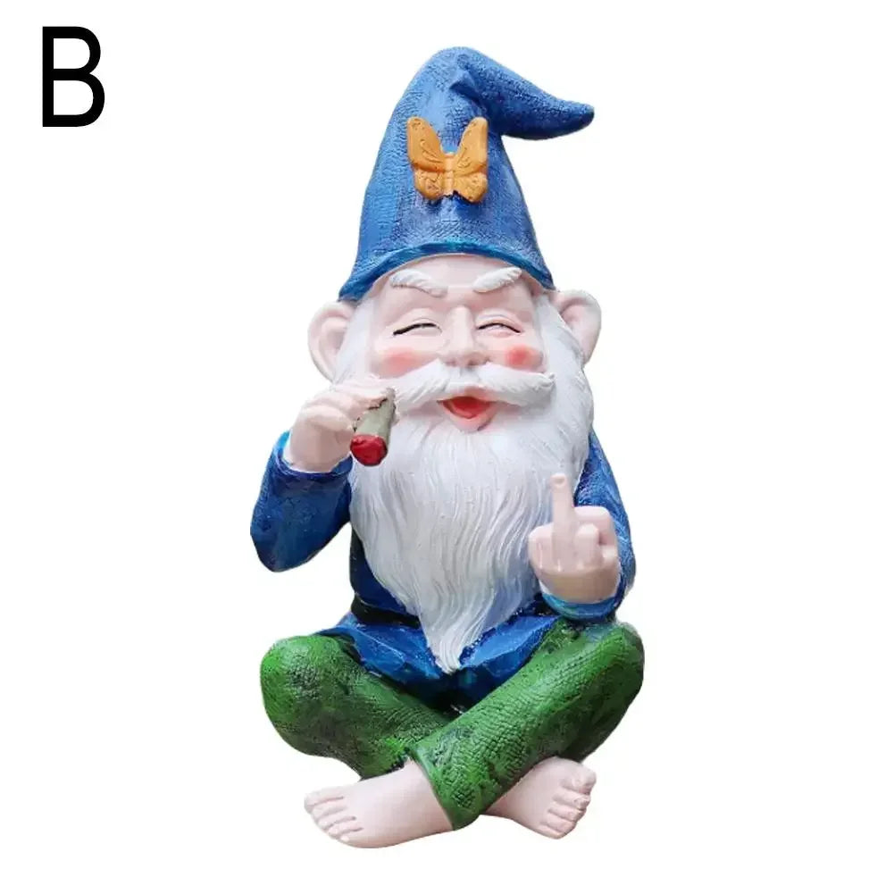 Sitting gnome statue with a blue hat, orange butterfly, and white beard smokes a cigar and raises middle finger, wearing blue shirt and green pants. Letter “B” on the top left.