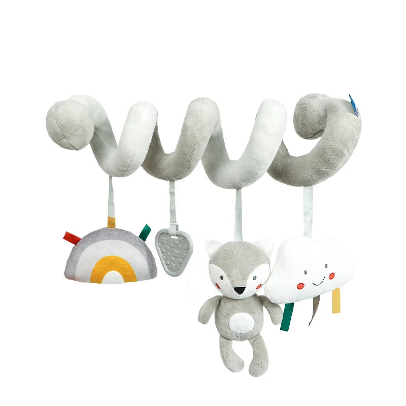 Plush spiral toy with hanging elements: a rainbow, a textured teether, a fox, and a smiling cloud. Soft gray and white color scheme, suitable for infants.