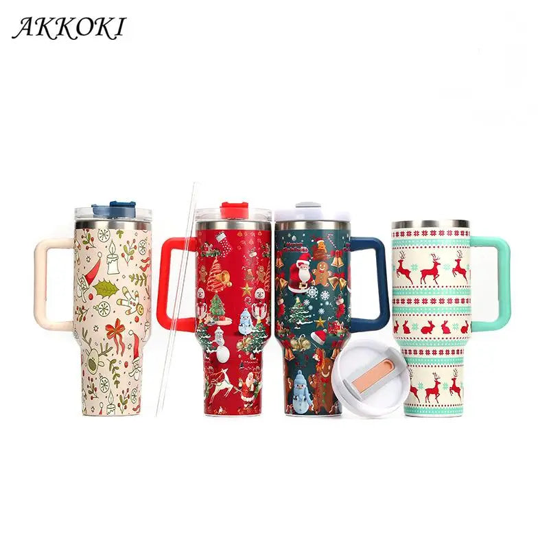 Four holiday-themed mugs with handles feature festive designs of holly, Santa, snowmen, and reindeer. Each mug has a lid, with an additional straw and detachable lid nearby.