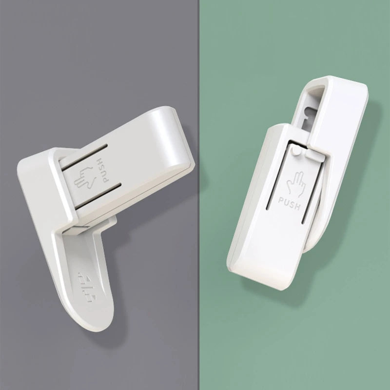 Two white wall-mounted hooks with "PUSH" labels and hand icons, shown on gray and green backgrounds. The hooks are in a folded position for space-saving storage.
