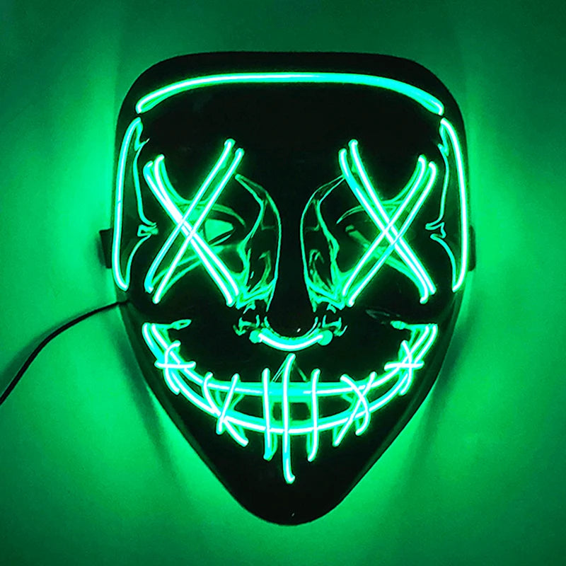 A glowing neon mask with green lights. It features X-shaped eyes and a stitched mouth design, illuminating the dark background with an eerie glow.