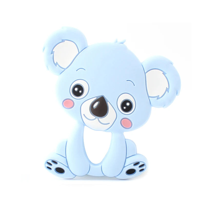 Cute cartoon blue koala with big eyes and rosy cheeks, sitting on a white background. The koala has a smiling expression and plush-like texture.
