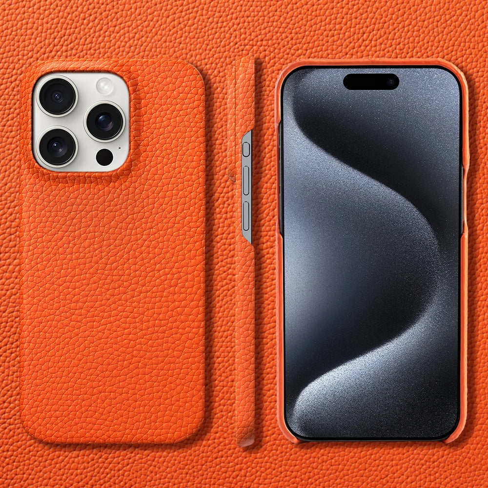 Orange leather-textured phone cases displayed around a smartphone. The phone's back features triple cameras, and the screen shows a wavy pattern. All items match the orange background.