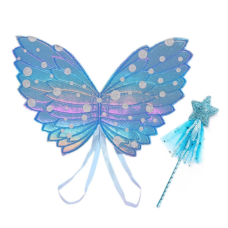 Blue fairy wings with silver polka dots and ribbon ties, paired with a matching star wand adorned with blue sequins and tulle. Both are iridescent and colorful.