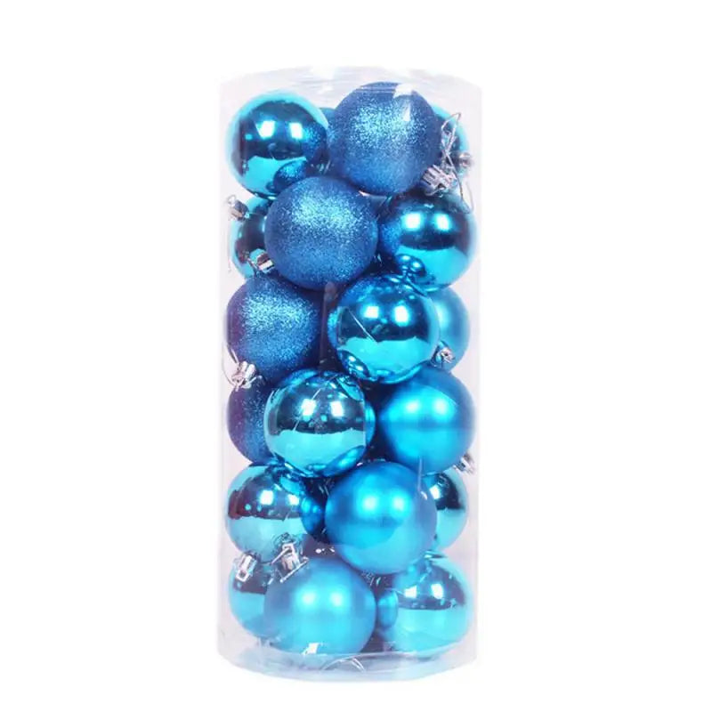 A clear cylindrical container holds an assortment of shiny and matte blue Christmas baubles, elegantly stacked and ready for festive decoration.