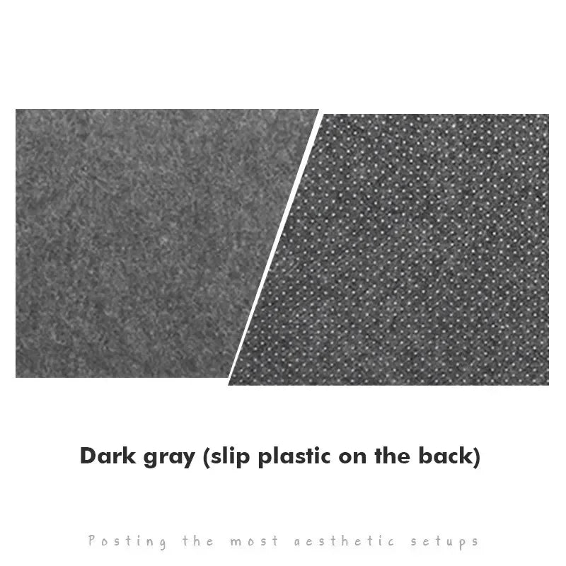 Close-up of two textures: a dark gray felt-like surface and a dotted slip-resistant plastic backing. Caption reads "Dark gray (slip plastic on the back)."