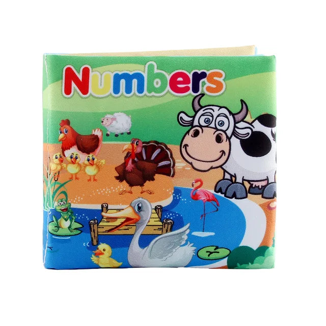 Brightly colored children's book cover titled "Numbers," featuring cartoon animals like a cow, ducklings, swan, flamingo, and turkey in a farm-like setting.