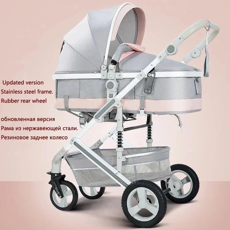 Modern baby stroller with a pink and gray design, featuring a stainless steel frame and rubber rear wheels. Text highlights updated version details in English and Russian.