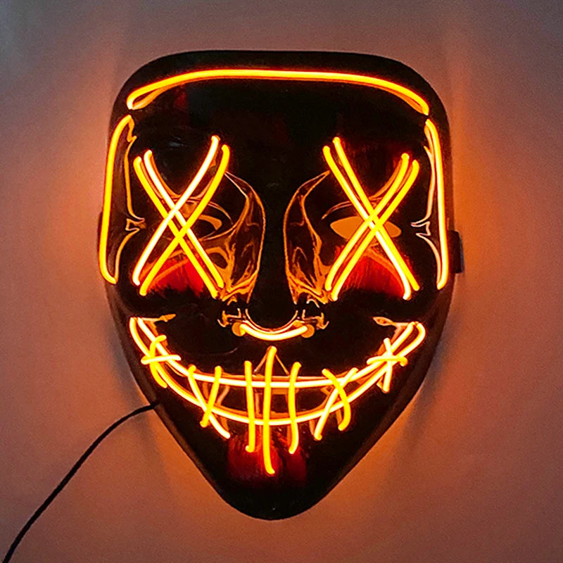 Glowing neon mask with orange lights, featuring X'ed eyes and a stitched smile design, plugged in against a plain background.