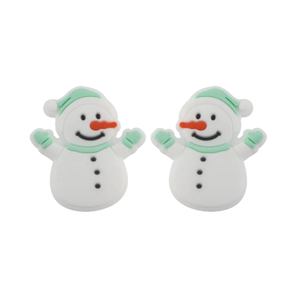 Two cartoon snowmen with green hats and mittens, orange carrot noses, black button eyes, and smiling mouths. They each have three black buttons on their round, white bodies.