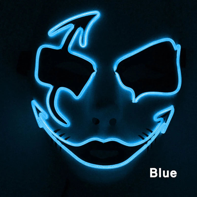 Glowing neon mask with twisted, abstract features outlined in blue light, creating a mysterious face in the dark. The word "Blue" is displayed in the lower right corner.