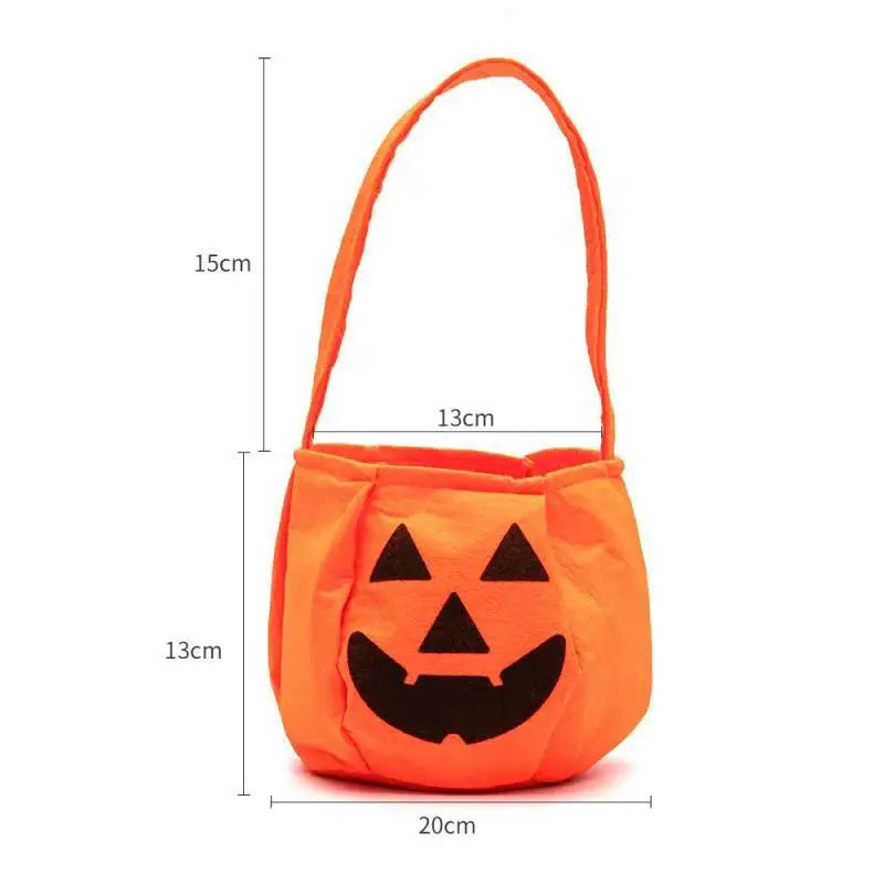 Orange pumpkin-shaped bag with a black jack-o'-lantern face, measuring 20cm wide, 13cm tall, and a handle extending 15cm. Ideal for Halloween treats.