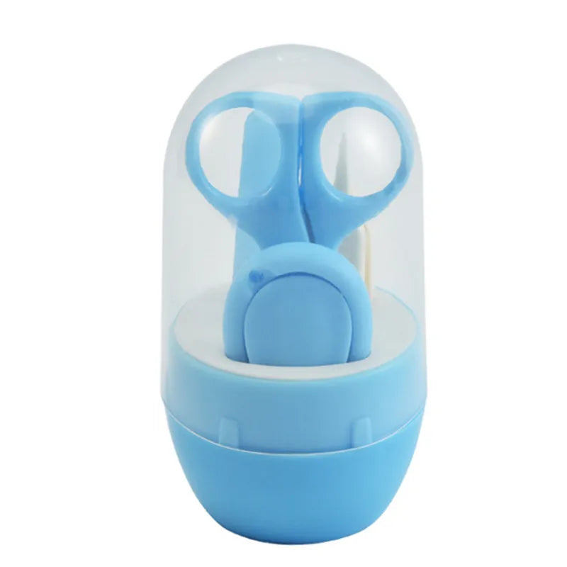 Clear plastic container holding small blue scissors and tools, featuring a rounded blue base and a transparent dome-shaped lid.