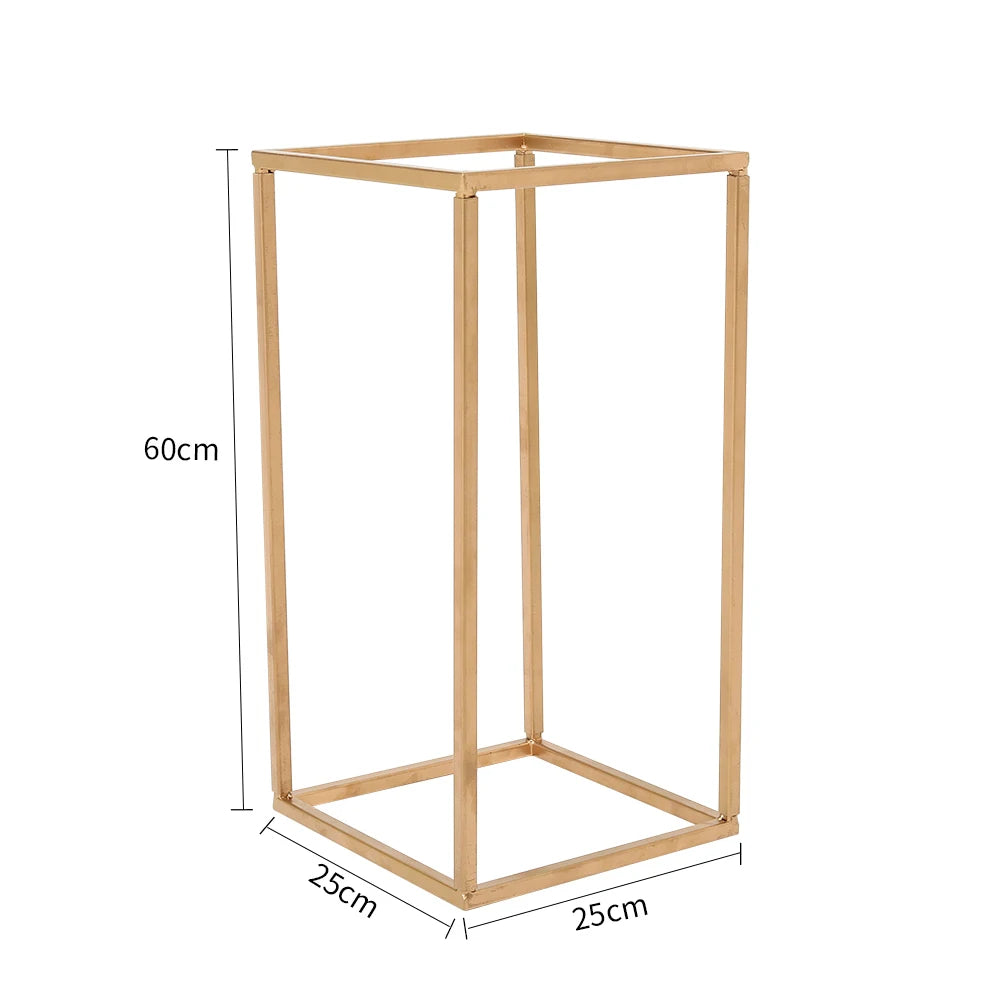 A gold rectangular metal frame measuring 60 cm in height and 25 cm in width and depth.