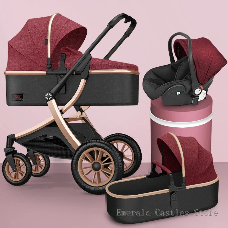Modern stroller set with a burgundy and black design, featuring a matching car seat and bassinet. The stroller has gold accents and large wheels, set against a soft pink background.