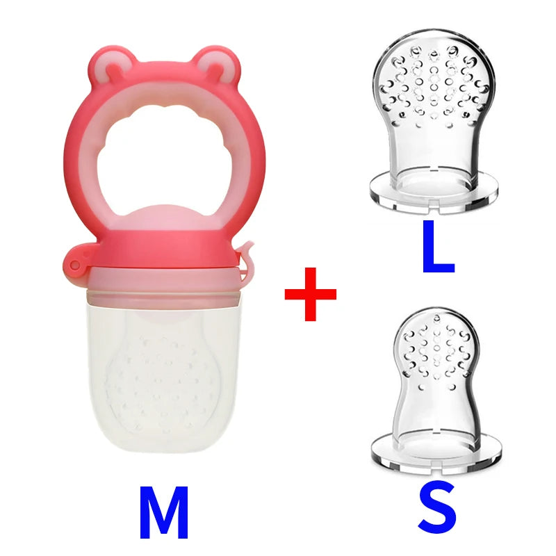 Pink baby food feeder with bear ear handle, shown with two transparent silicone replacement nipples, labeled "L" for large and "S" for small. "M" indicates the medium feeder size.
