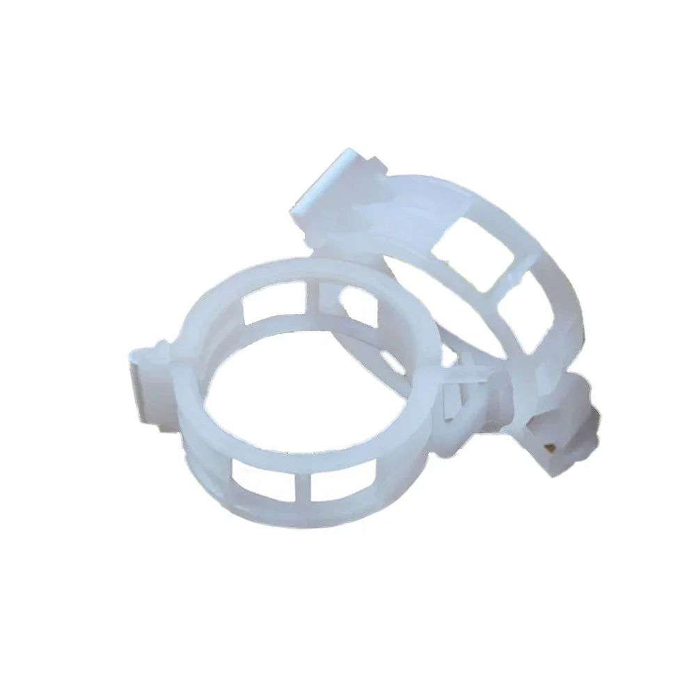 Plastic cylindrical cage structure with multiple vertical and horizontal slats, featuring an interlocking mechanism, designed for engineering or mechanical applications.