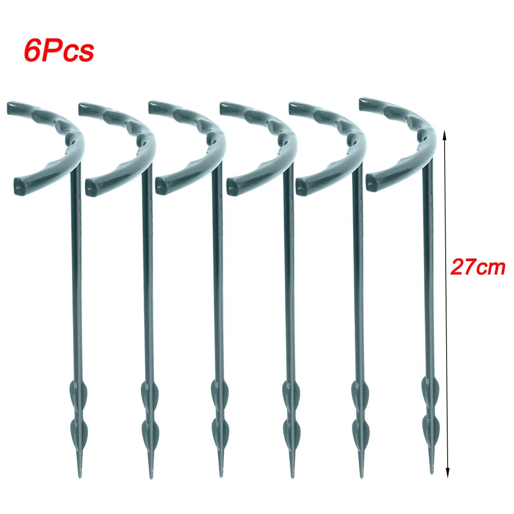 Six green gardening stakes, each 27cm tall, with curved tops and pointed ends. Red text on the left reads "6Pcs."