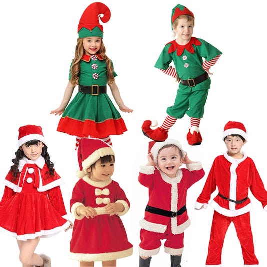 Children in festive costumes: two in green elf outfits and four in red Santa-style attire, complete with hats and festive detailing, smiling against a white background.
