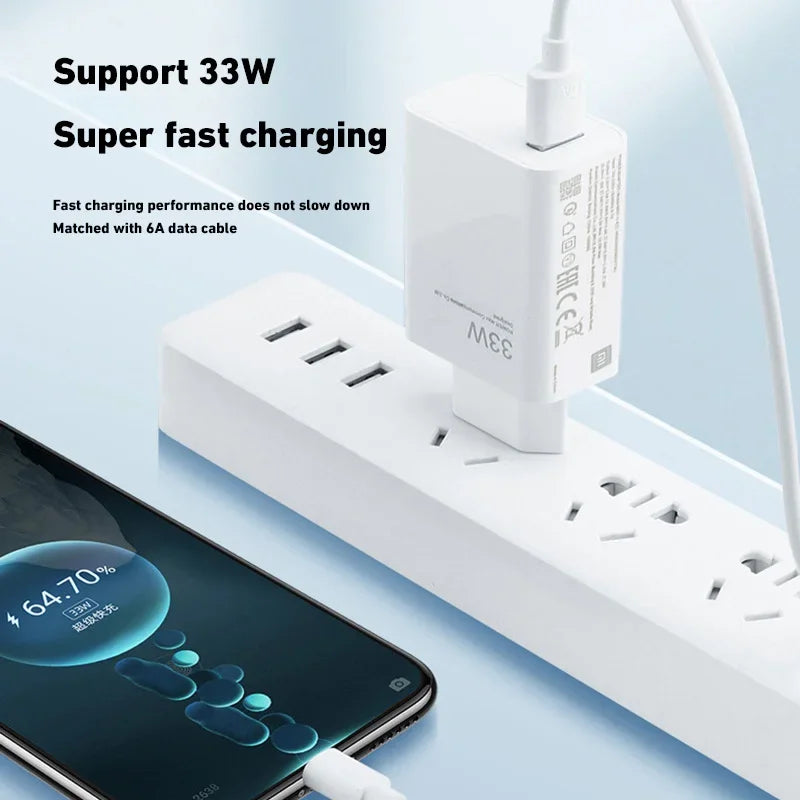 A smartphone charging with a 33W fast charger connected to a power strip. Display shows 64.7% charged. Text highlights super fast charging with 6A data cable.