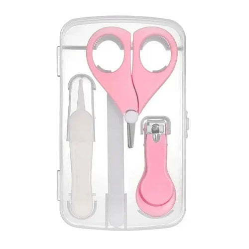 Pink and white baby grooming kit in a transparent case, featuring safety scissors, nail clippers, a file, and a nasal aspirator. Compact design for infant care.