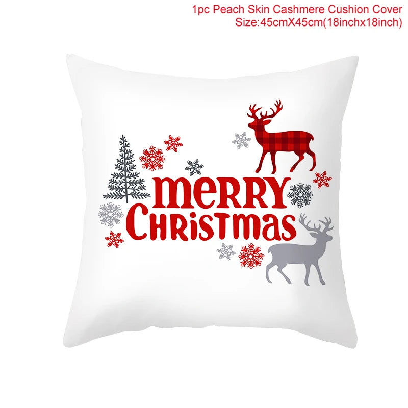 White cushion cover with "Merry Christmas" text, red plaid and gray reindeer silhouettes, snowflakes, and tree prints. Size: 45cm x 45cm.