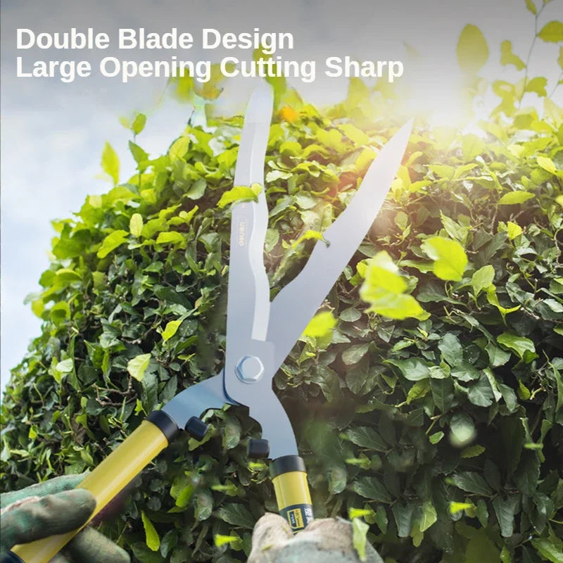 Gardening shears with a double blade design are used to trim a leafy hedge, highlighted by sunlight. Text on image reads "Double Blade Design Large Opening Cutting Sharp."